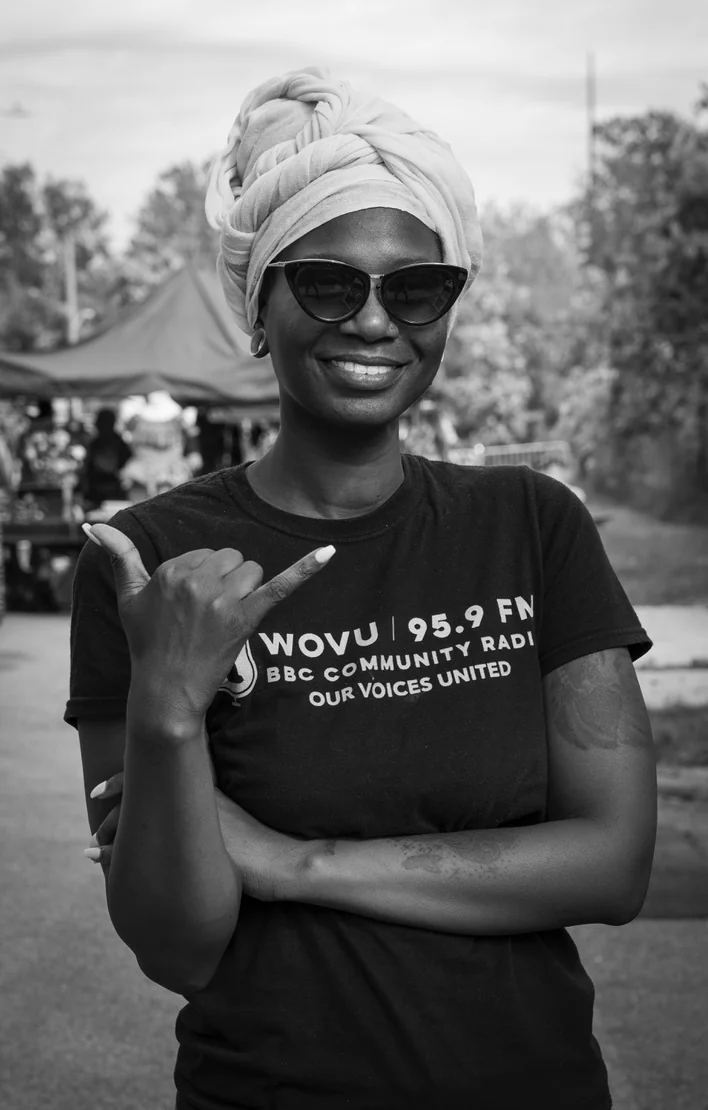 Black and white portrait of DJ Black Unicorn in WOVU apparel